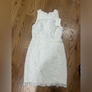 Brand new white lace dress. size xs
endless rose